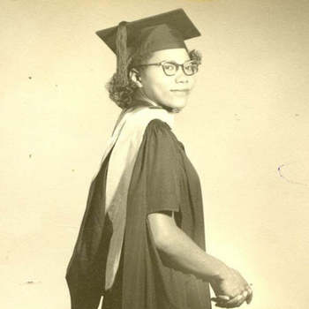 Nancy Randolph Davis, a young Black woman wearing a graduation gown and cap